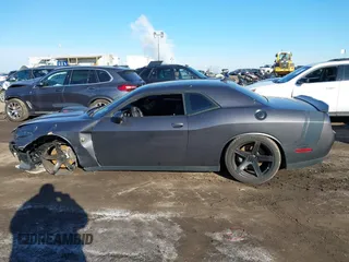 2016 Dodge Challenger R/T Scat Pack z VIN 2C3CDZFJ1GH249729, wystawiony jako IAAI lot #41589369 z przebiegiem 44 555 mil mil oraz . Historia ofert i sprzedaży dostępna na DreamBid. Obrazek 14.