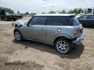 2007 MINI Hardtop S with VIN WMWMF73577TT84087, listed as a Copart auction lot 60208895 with 76,248 mi miles and Salvage title. Bid and sale history available at DreamBid. Image 2.