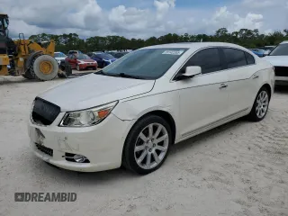 2013 Buick LaCrosse Touring с VIN 1G4GJ5G35DF302150, выставлен на аукционе Copart как лот 55142355 с пробегом 131 571 миль миль и Списание • Salvage title. История ставок и продаж доступна на DreamBid. Изображение 1.