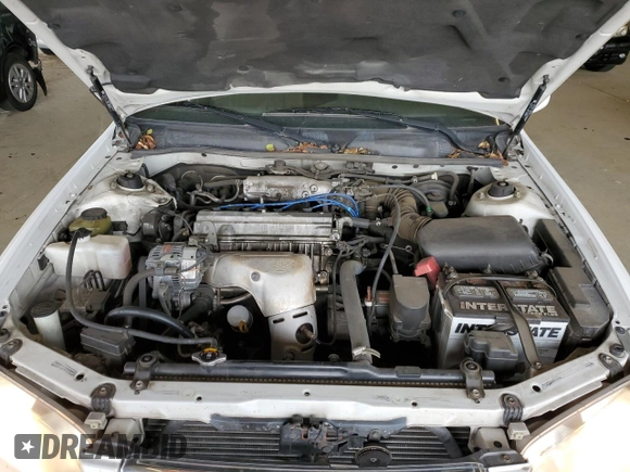 2000 Toyota Camry CE с VIN JT2BG22K8Y0425596, выставлен на аукционе Copart как лот 58956375 с пробегом 217 960 миль миль и Списание • Salvage title. История ставок и продаж доступна на DreamBid. Изображение 11.