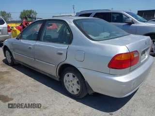 2000 Honda Civic VP with VIN 2HGEJ6610YH505518, listed as a IAAI auction lot 42181742 with 174,836 mi miles. Bid and sale history available at carsss.com. Image 3.