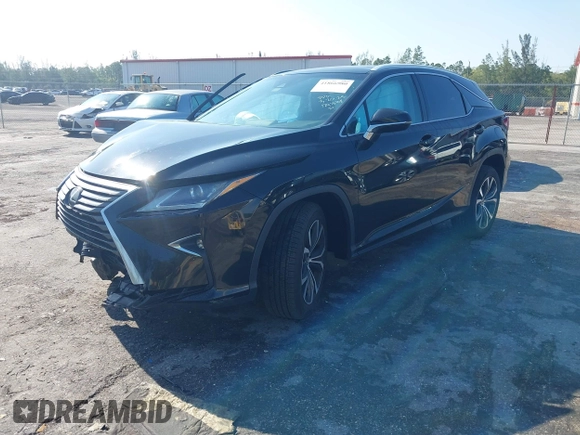 2019 Lexus RX with VIN 2T2ZZMCA4KC129338, listed as a IAAI auction lot 41866980 with 72,265 mi miles. Bid and sale history available at carsss.com. Image 18.