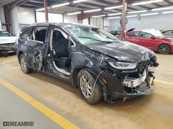2023 Chrysler Pacifica Touring L with VIN 2C4RC1BG3PR582271, listed as a Copart auction lot 51644595 with 57,930 mi miles and Salvage Title. Bid and sale history available at carsss.com. Image 4.