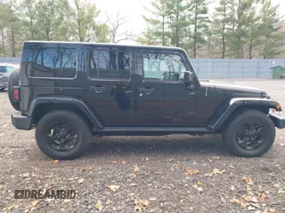2015 Jeep Wrangler Unlimited Sahara with VIN 1C4HJWEG0FL661723, listed as a IAAI auction lot 41998393 with 89,077 mi miles. Bid and sale history available at carsss.com. Image 13.