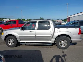 2004 Ford Explorer Sport Trac XLS z VIN 1FMDU77K74UB69268, wystawiony jako IAAI lot #42055157 z przebiegiem 127 573 mil mil oraz . Historia ofert i sprzedaży dostępna na DreamBid. Obrazek 14.
