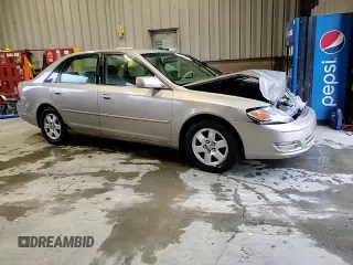 2000 Toyota Avalon XL with VIN 4T1BF28B1YU033159, listed as a Copart auction lot 52796755 with 247,062 mi miles and Salvage Title. Bid and sale history available at DreamBid. Image 10.