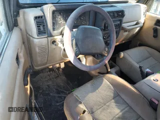 2000 Jeep Wrangler Sport with VIN 1J4FA49S7YP802304, listed as a Copart auction lot 47854795 with 0 mi miles and Salvage Title. Bid and sale history available at carsss.com. Image 8.