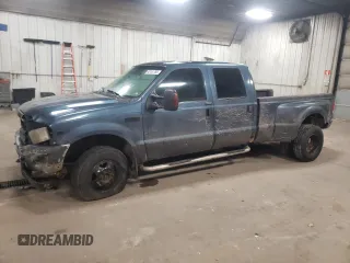2004 Ford F-350 with VIN 1FTWW33S74EA83233, listed as a Copart auction lot 43161765 with 309,120 mi miles and Salvage title. Bid and sale history available at DreamBid. Image 1.