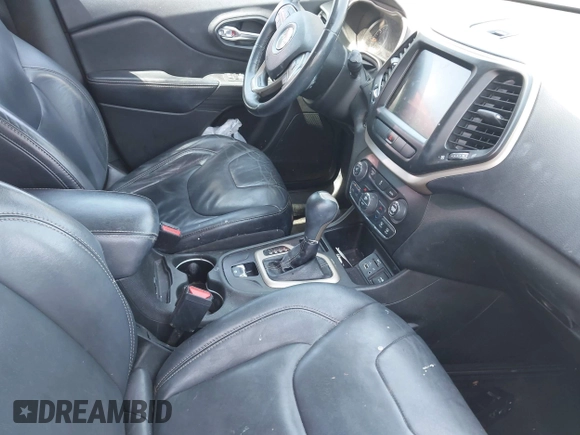 2015 Jeep Cherokee Limited with VIN 1C4PJLDB4FW584952, listed as a IAAI auction lot 42027257 with 146,198 mi miles and . Bid and sale history available at DreamBid. Image 5.