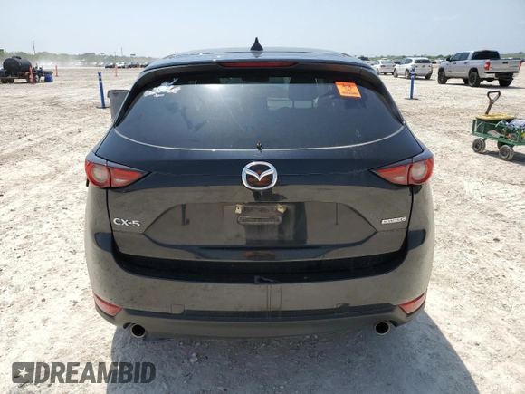 2021 Mazda CX-5 Grand Touring with VIN JM3KFADM5M0479247, listed as a Copart auction lot 51219915 with 33,384 mi miles and Salvage Title. Bid and sale history available at carsss.com. Image 6.