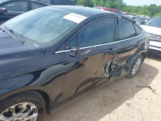 2016 Ford Fusion S z VIN 3FA6P0G73GR121162, wystawiony jako IAAI lot #42298022 z przebiegiem 160 978 mil mil oraz . Historia ofert i sprzedaży dostępna na DreamBid. Obrazek 6.