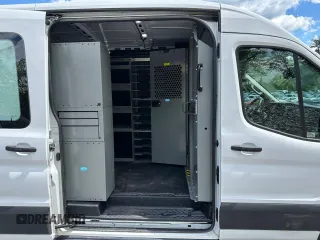 2020 Ford Transit Cargo z VIN 1FTBR1CG3LKB36452, wystawiony jako Copart lot #58659545 z przebiegiem 171 504 mil mil oraz Tytuł czysty. Historia ofert i sprzedaży dostępna na DreamBid. Obrazek 6.