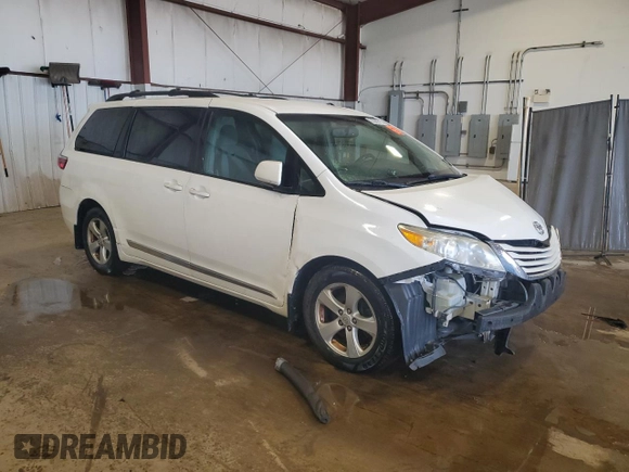 2016 Toyota Sienna LE AAS with VIN 5TDKK3DC6GS764404, listed as a Copart auction lot 63380615 with 123,221 mi miles and Salvage title. Bid and sale history available at DreamBid. Image 4.