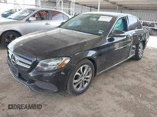 2015 Mercedes-Benz C-Class C 300 with VIN 55SWF4JB3FU071427, listed as a IAAI auction lot 41722139 with 130,966 mi miles. Bid and sale history available at carsss.com. Image 2.