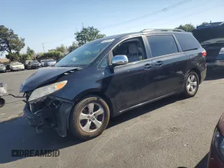2015 Toyota Sienna LE AAS with VIN 5TDKK3DC6FS604568, listed as a Copart auction lot 63348145 with 127,657 mi miles and Salvage title. Bid and sale history available at DreamBid. Image 1.