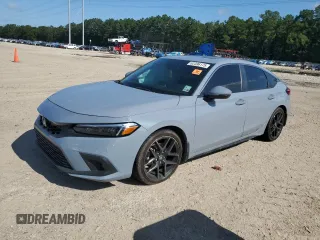 2023 Honda Civic Sport Touring with VIN 19XFL1H88PE015882, listed as a Copart auction lot 62396175 with 23,797 mi miles and Salvage title. Bid and sale history available at DreamBid. Image 1.