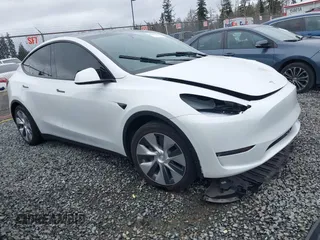 2023 Tesla Model Y Long Range with VIN 7SAYGDEE7PF809164, listed as a IAAI auction lot 41828974 with 31,772 mi miles. Bid and sale history available at carsss.com. Image 1.