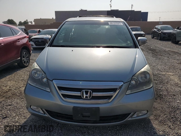 2006 Honda Odyssey EX-L z VIN 5FNRL38756B087695, wystawiony jako Copart lot #60122525 z przebiegiem 213 221 mil mil oraz Szkoda całkowita • Salvage title. Historia ofert i sprzedaży dostępna na DreamBid. Obrazek 5.