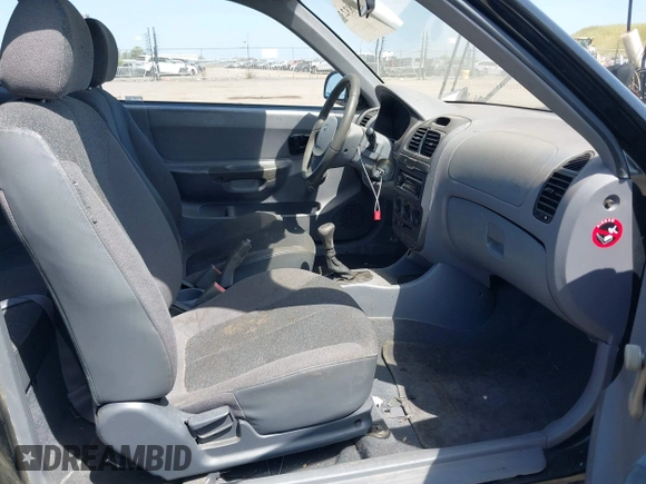 2003 Hyundai Accent with VIN KMHCF35CX3U271513, listed as a IAAI auction lot 42083235 with 166,240 mi miles. Bid and sale history available at carsss.com. Image 5.