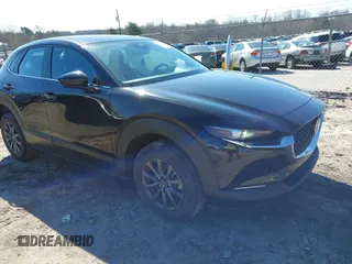 2021 Mazda CX-30 2.5 S with VIN 3MVDMAALXMM269676, listed as a IAAI auction lot 41581451 with 33,449 mi miles. Bid and sale history available at carsss.com. Image 1.