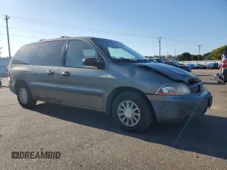 2001 Ford Windstar LX with VIN 2FMZA51441BA35669, listed as a Copart auction lot 73283214 with 240,538 mi miles and Salvage Title. Bid and sale history available at carsss.com. Image 4.
