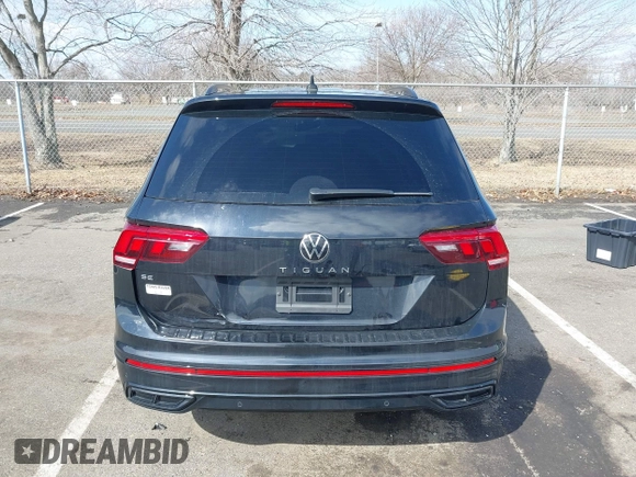 2023 Volkswagen Tiguan SE R-Line Black with VIN 3VVCB7AXXPM094621, listed as a IAAI auction lot 41737103 with 21,069 mi miles and . Bid and sale history available at DreamBid. Image 16.
