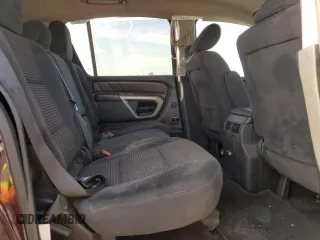 2015 Nissan Armada Platinum z VIN 5N1AA0NC6FN606043, wystawiony jako Copart lot #60546925 z przebiegiem 98 909 mil mil oraz Szkoda całkowita • Salvage title. Historia ofert i sprzedaży dostępna na DreamBid. Obrazek 11.