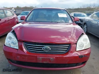 2008 Kia Optima LX with VIN KNAGE123885257626, listed as a IAAI auction lot 42072433 with 106,572 mi miles. Bid and sale history available at carsss.com. Image 12.