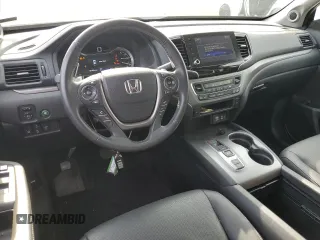 2023 Honda Ridgeline RTL with VIN 5FPYK3F53PB067003, listed as a Copart auction lot 58384895 with 31,983 mi miles and Salvage title. Bid and sale history available at DreamBid. Image 8.