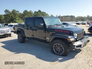 2023 Jeep Gladiator High Altitude with VIN 1C6HJTFG6PL523237, listed as a Copart auction lot 75999734 with 53,363 mi miles and Salvage title. Bid and sale history available at DreamBid. Image 4.