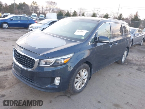 2016 Kia Sedona SX with VIN KNDMC5C10G6158467, listed as a IAAI auction lot 41733034 with 123,306 mi miles and . Bid and sale history available at carsss.com. Image 2.