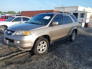 2004 Acura MDX Touring Pkg RES w/Nav with VIN 2HNYD18914H515942, listed as a IAAI auction lot 41944360 with 270,096 mi miles. Bid and sale history available at carsss.com. Image 2.