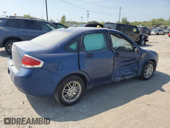 2009 Ford Focus SE with VIN 1FAHP35N69W173977, listed as a Copart auction lot 69018554 with 138,496 mi miles and Salvage Title. Bid and sale history available at DreamBid. Image 3.