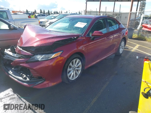 2020 Toyota Camry LE with VIN 4T1C11AK4LU916494, listed as a IAAI auction lot 41786429 with 100,032 mi miles and . Bid and sale history available at DreamBid. Image 2.