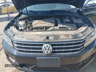 2016 Volkswagen Passat SE z VIN 1VWBT7A39GC033702, wystawiony jako IAAI lot #40547421 z przebiegiem 122 206 mil mil oraz . Historia ofert i sprzedaży dostępna na DreamBid. Obrazek 10.