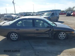 2000 Oldsmobile Intrigue GX z VIN 1G3WH52H0YF280823, wystawiony jako IAAI lot #42199925 z przebiegiem 102 427 mil mil oraz . Historia ofert i sprzedaży dostępna na DreamBid. Obrazek 13.