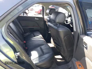 2008 Cadillac STS RWD z VIN 1G6DW67V980103498, wystawiony jako IAAI lot #41950340 z przebiegiem 92 859 mil mil oraz . Historia ofert i sprzedaży dostępna na DreamBid. Obrazek 8.