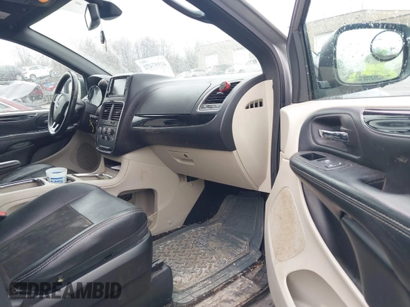 2019 Dodge Grand Caravan SXT with VIN 2C4RDGCG1KR580039, listed as a IAAI auction lot 41997472 with 163,915 mi miles and . Bid and sale history available at DreamBid. Image 5.