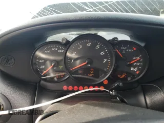 2000 Porsche Boxster z VIN WP0CA2984YU627674, wystawiony jako Copart lot #86027054 z przebiegiem 112 153 mil mil oraz Szkoda całkowita • Salvage title. Historia ofert i sprzedaży dostępna na DreamBid. Obrazek 9.