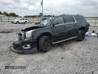 2015 GMC Yukon XL SLT with VIN 1GKS2HKC0FR686865, listed as a Copart auction lot 60079984 with 163,404 mi miles and Non Repairable. Bid and sale history available at carsss.com. Image 1.