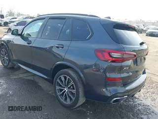 2021 BMW X5 xDrive45e with VIN 5UXTA6C00M9D24349, listed as a IAAI auction lot 41458445 with 43,116 mi miles. Bid and sale history available at carsss.com. Image 3.