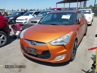 2012 Hyundai Veloster w/Black Int z VIN KMHTC6AD4CU049722, wystawiony jako IAAI lot #42594609 z przebiegiem 72 324 mil mil oraz . Historia ofert i sprzedaży dostępna na DreamBid. Obrazek 6.