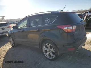 2018 Ford Escape Titanium with VIN 1FMCU9J95JUA36324, listed as a Copart auction lot 47131825 with 63,563 mi miles and Salvage title. Bid and sale history available at DreamBid. Image 2.