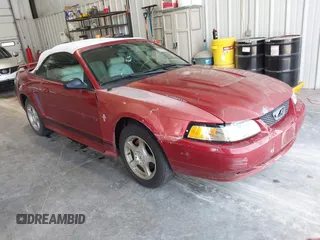 2003 Ford Mustang Deluxe z VIN 1FAFP44403F407592, wystawiony jako IAAI lot #42409746 z przebiegiem 211 269 mil mil oraz . Historia ofert i sprzedaży dostępna na DreamBid. Obrazek 1.