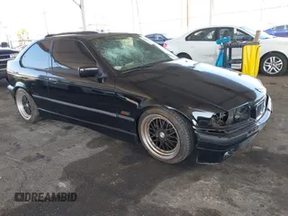 1996 BMW 3-Series 318TI with VIN WBACG8324TAU38424, listed as a IAAI auction lot 41529537 with 160,199 mi miles. Bid and sale history available at carsss.com. Image 1.