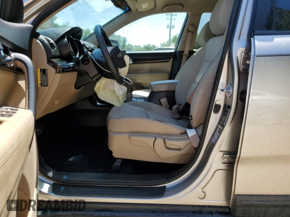 2013 Kia Sorento LX with VIN 5XYKT3A61DG372659, listed as a Copart auction lot 57787855 with 61,489 mi miles and Salvage title. Bid and sale history available at DreamBid. Image 7.