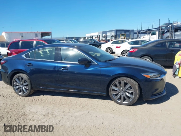 2021 Mazda 6 Grand Touring with VIN JM1GL1TY3M1619771, listed as a IAAI auction lot 40964809 with 25,816 mi miles and . Bid and sale history available at DreamBid. Image 13.