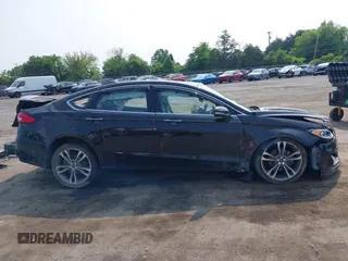 2019 Ford Fusion Titanium with VIN 3FA6P0D92KR247270, listed as a IAAI auction lot 42474803 with Not provided miles and . Bid and sale history available at DreamBid. Image 12.