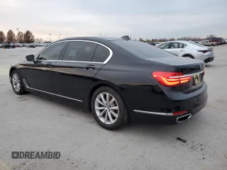 2018 BMW 7 Series 740i xDrive with VIN WBA7E4C50JGV23975, listed as a Copart auction lot 82354264 with 63,657 mi miles and Salvage Title. Bid and sale history available at carsss.com. Image 2.