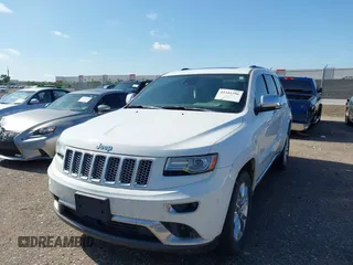 2014 Jeep Grand Cherokee Summit with VIN 1C4RJFJT3EC523129, listed as a IAAI auction lot 42341296 with 171,468 mi miles and . Bid and sale history available at DreamBid. Image 17.